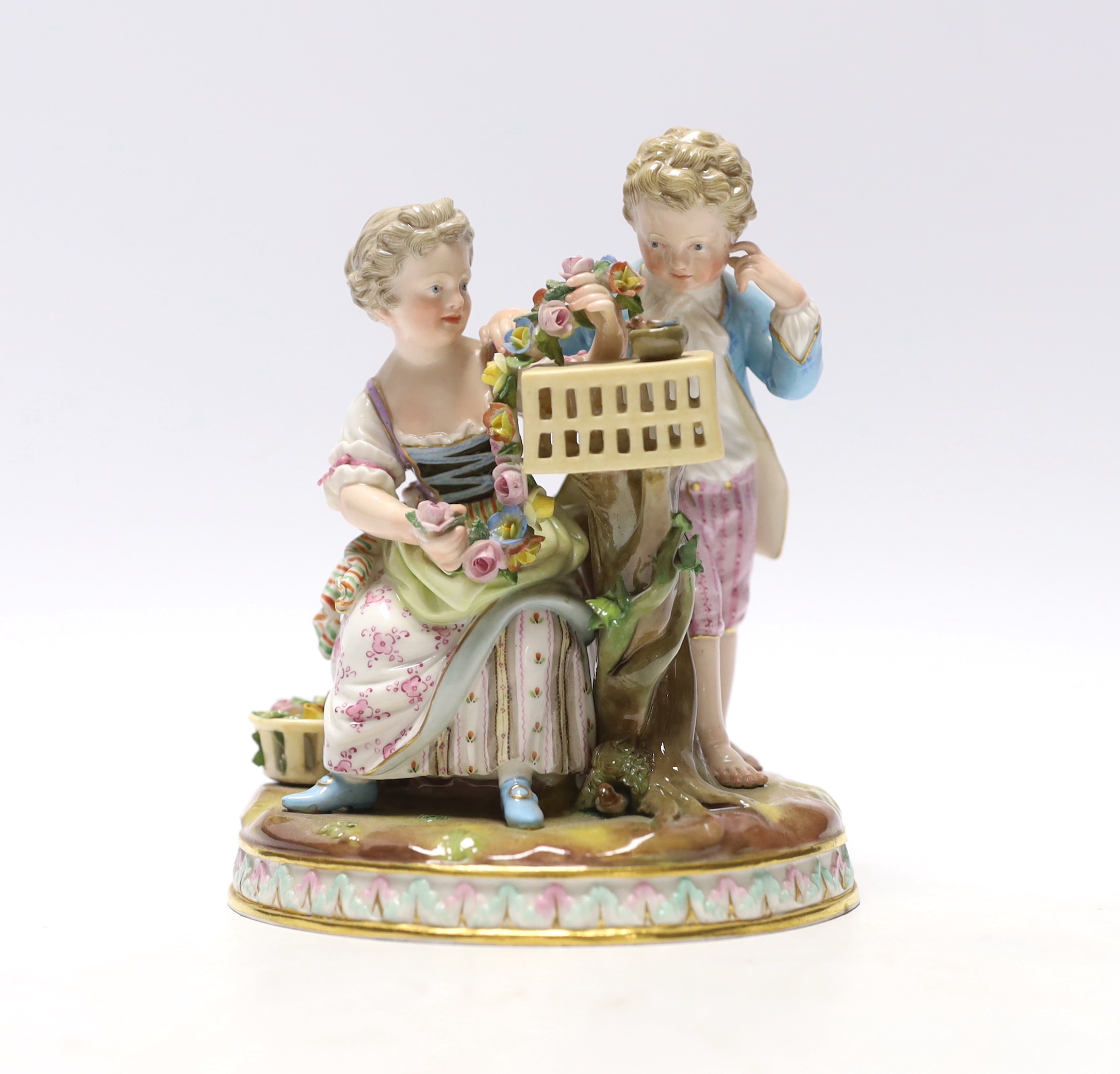 A Meissen birdcage group, 19th century, 14cm high